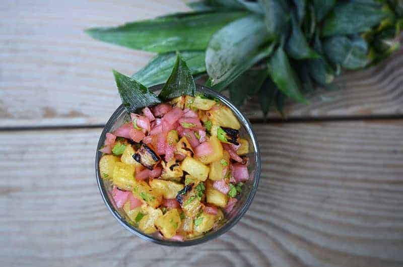 overhead view of a bowl of pineapple and red onion salsa