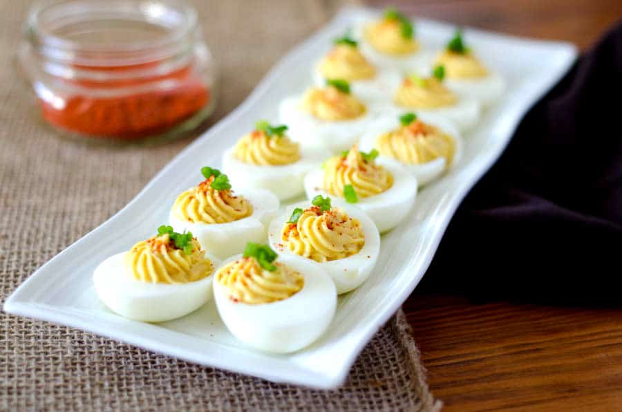 Deviled eggs on white plate