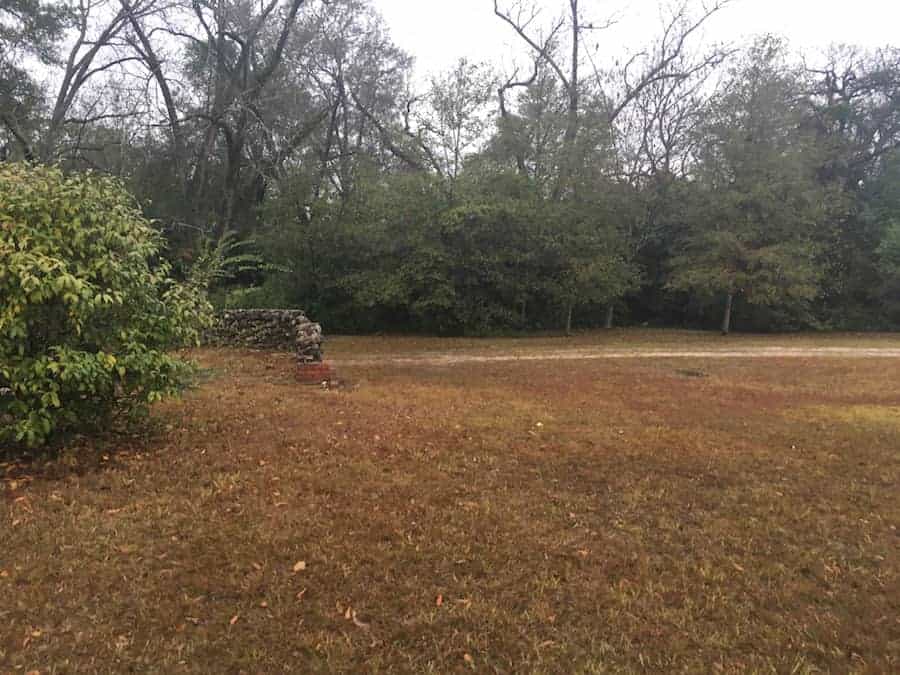 Field with rock wall