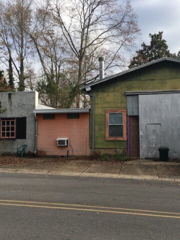 old buildings on side of the road