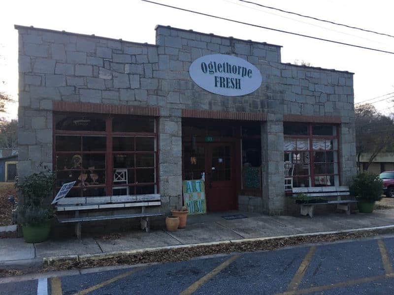 Stone storefront with sign reading Oglethorpe Fresh