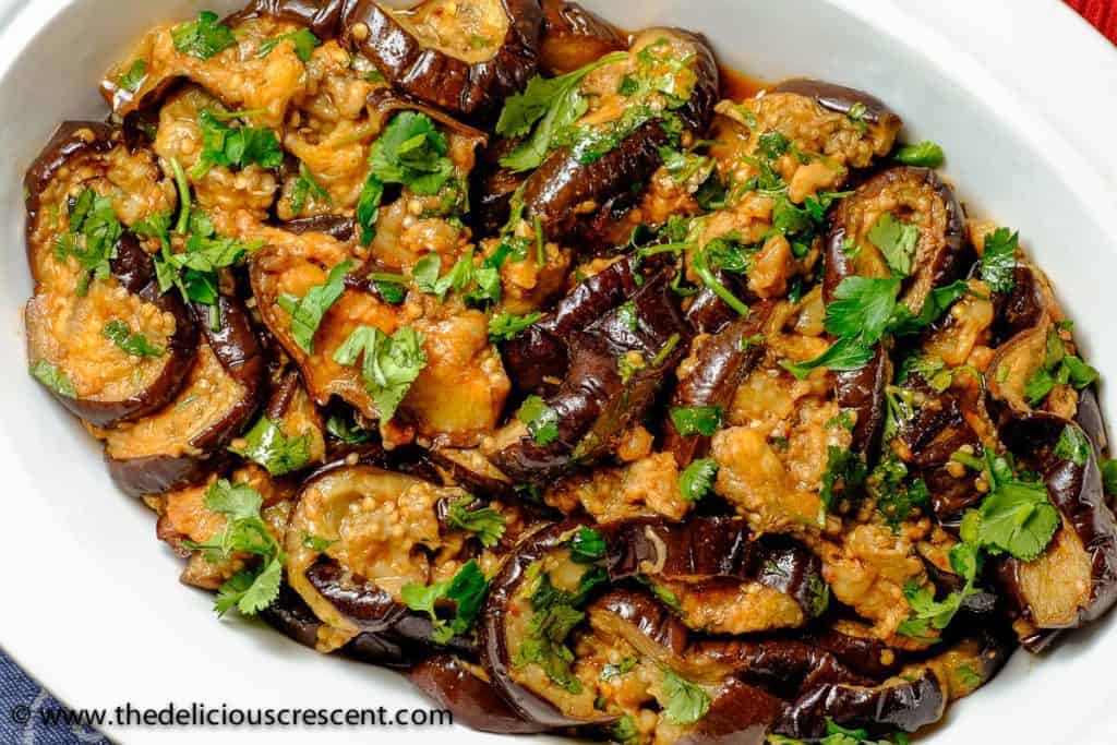 overhead view of casserole dish with baked eggplant