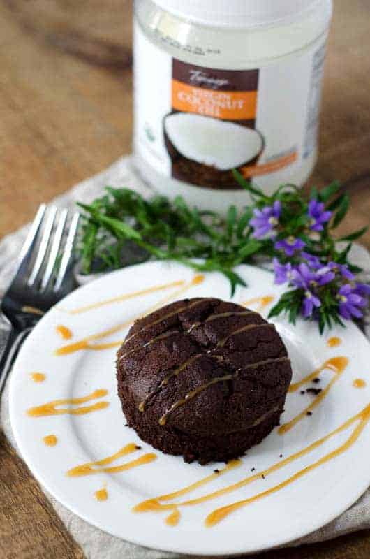 paleo mocha fudge cake with jar of coconut oil