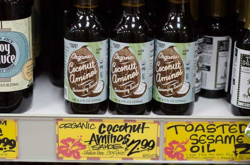 bottles of organic coconut aminos on shelf