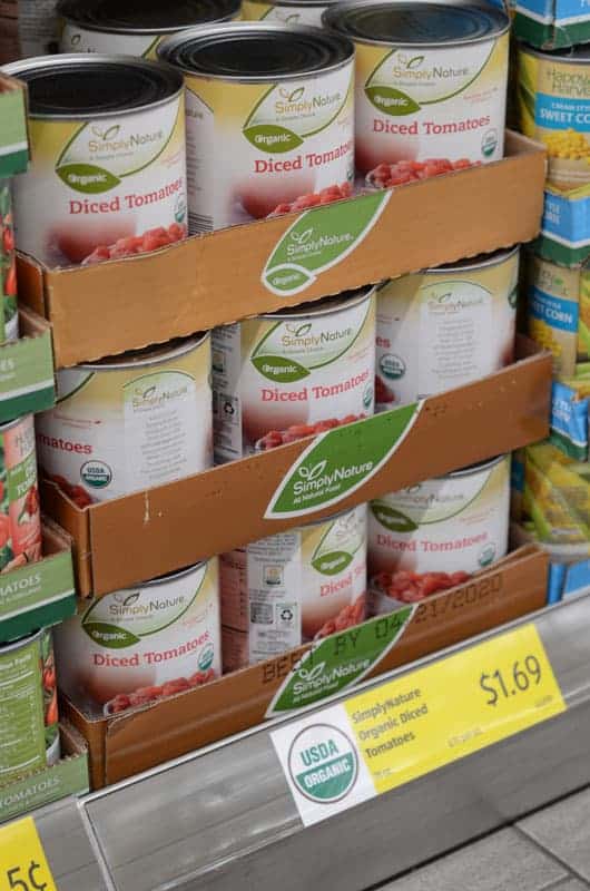 cans of diced tomatoes on shelf at Aldi