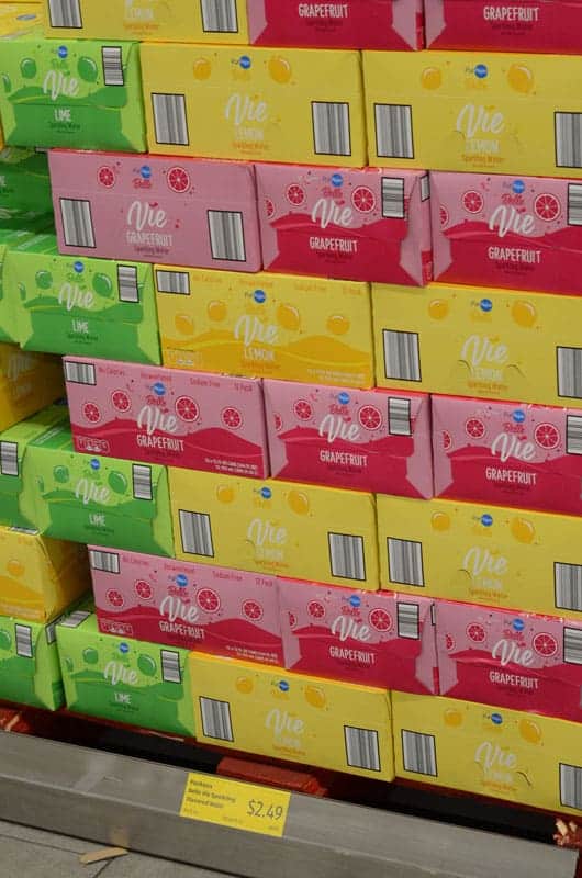 stacked cases of flavored seltzer at Aldi