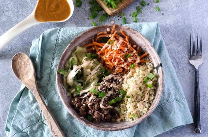 Overhead view of ground beef bulgogi bowl on table