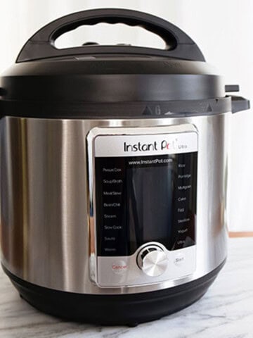 front view of a large instant pot with the lid on