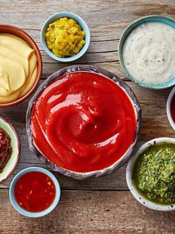 overhead view of different crocks of sauces