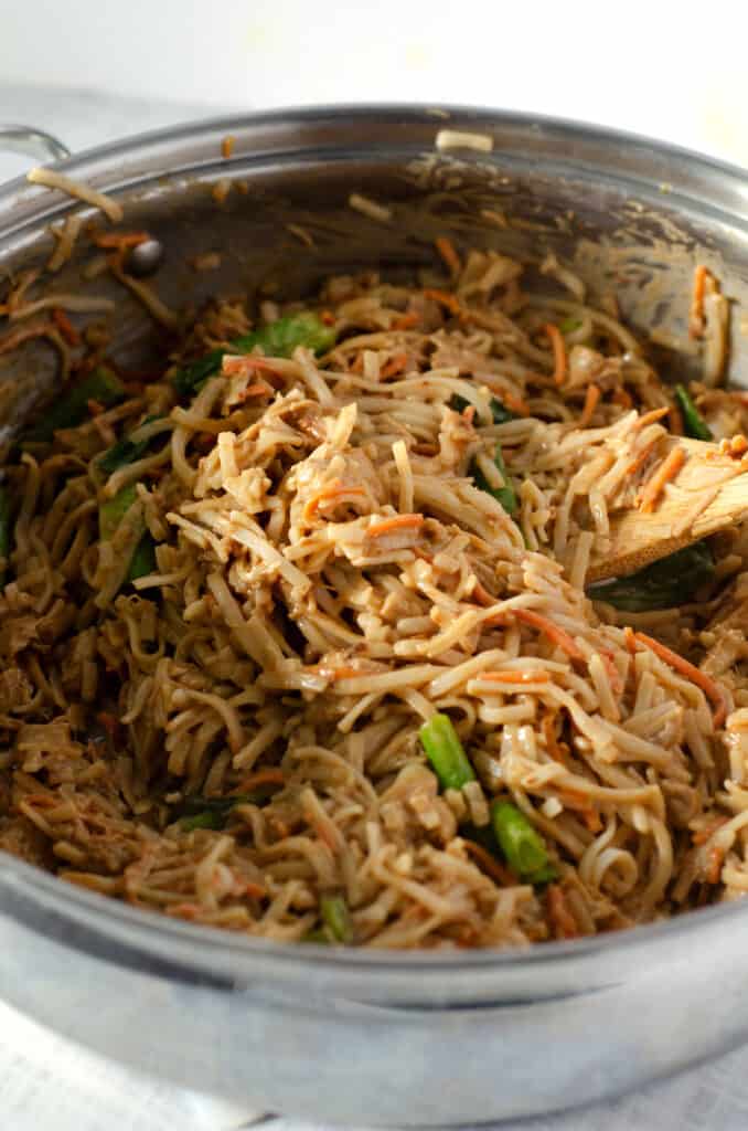 close up of gluten free pad thai mixed in a large skillet