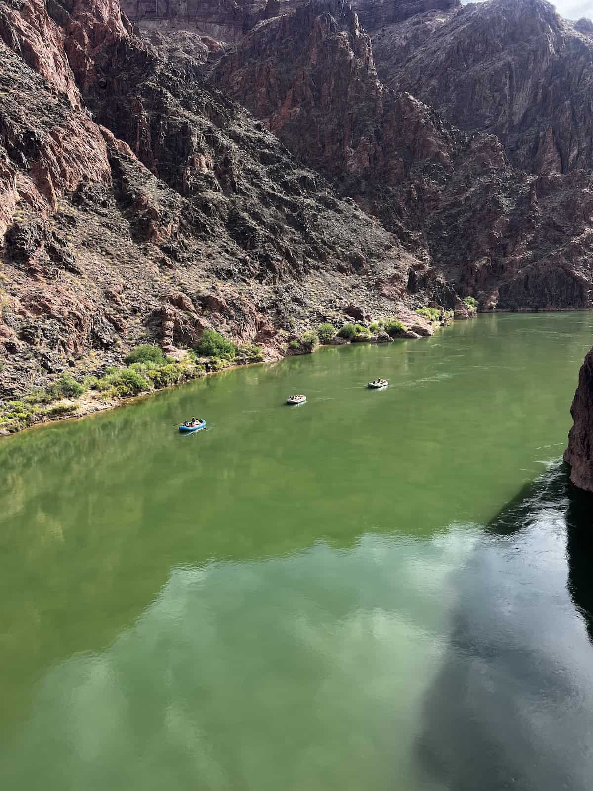 rafters coming down the colorado river in the grand canyon