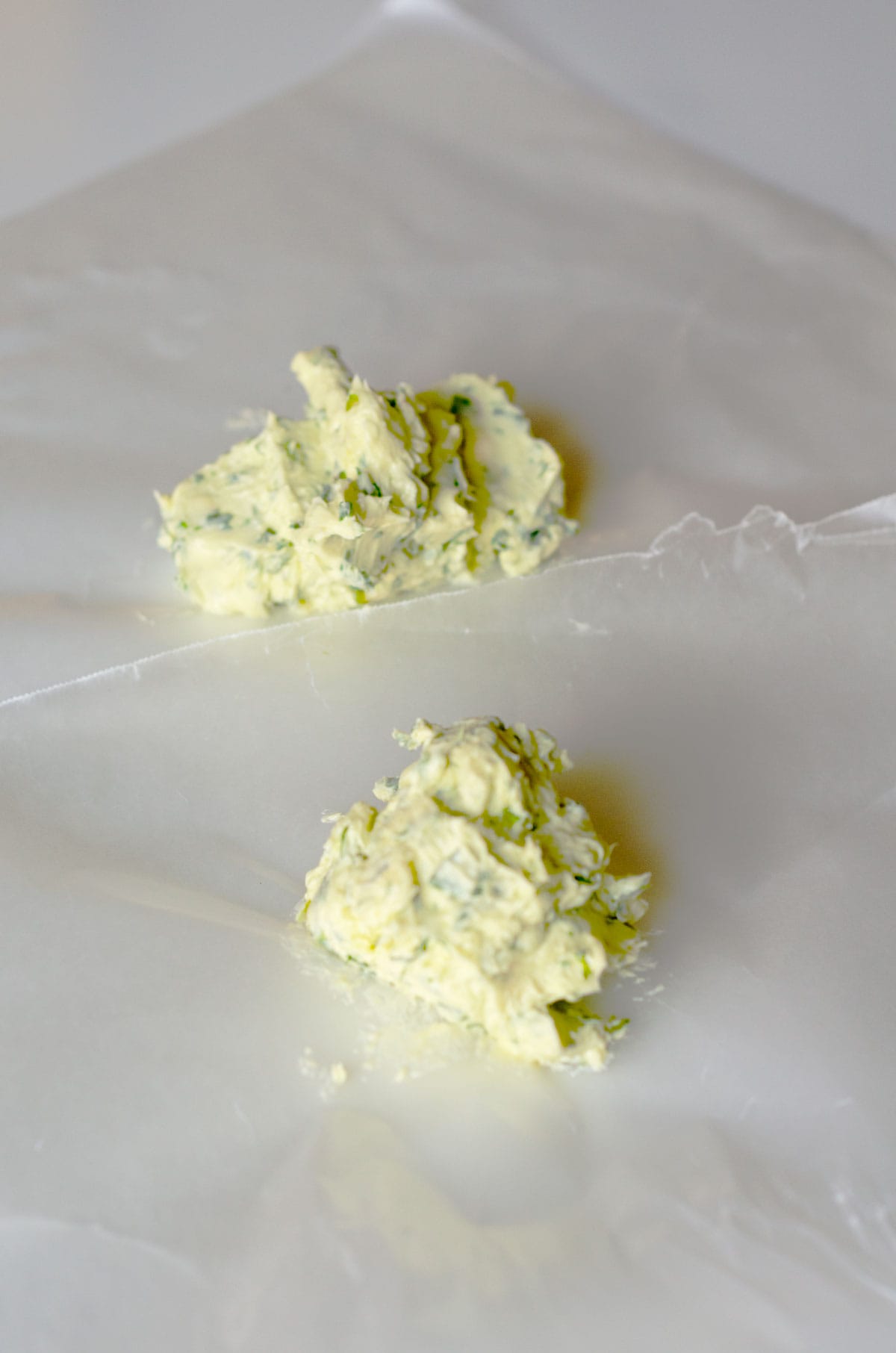 lumps of ramp butter on wax paper before getting rolled